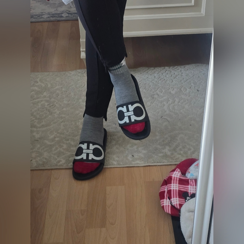Salvatore Ferragano Black and White Logo Slides